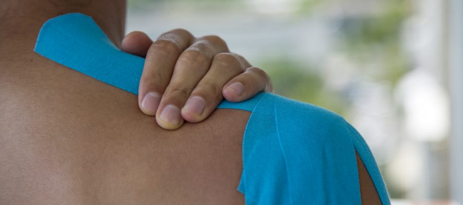 Adhesive bandage on shoulder